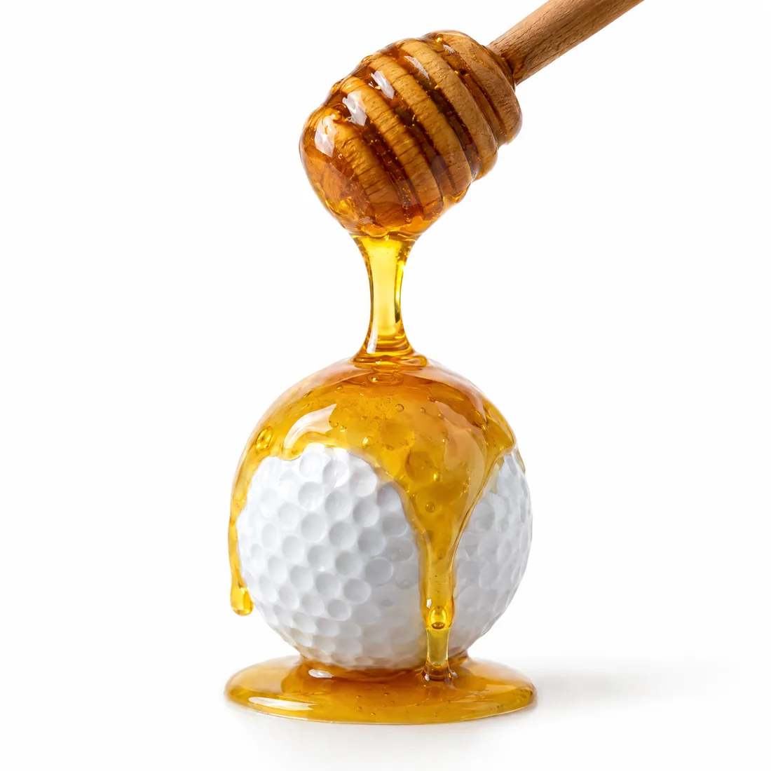 Tupelo honey drizzling over a golf ball